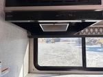 Interior with Stove Hood Exhaust Fan and Vent Cover