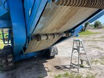Feeder with Abführbandrollen