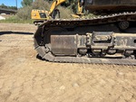 Undercarriage with Left Track Tensioner