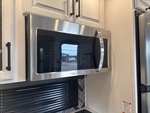 Interior with Stove Hood Exhaust Fan and Vent Cover