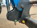 Specialty with Loader Quick Coupler